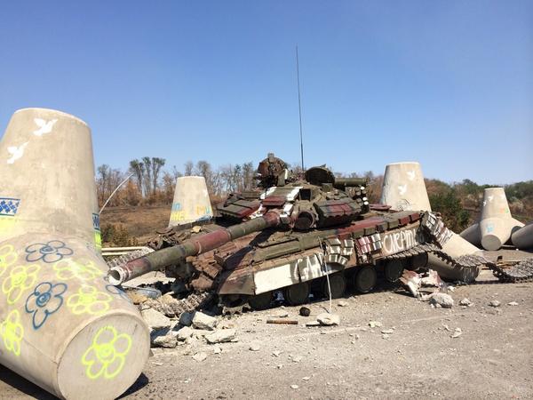 Tank - hit by fire between tank traps outside Mariupol on the road to Novoazovsk