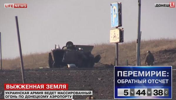 Lifenews added ceasefire T-5:44 and showed destroyed Russian APC