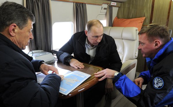 Putin flying over illegally annexed Crimea