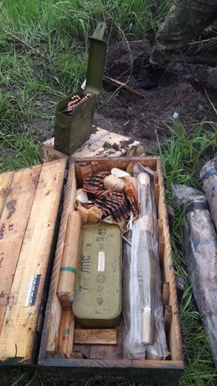 ATO spox: In Dnipropetrovsk region, SBU found a cache with 11 rocket launchers, 200g TNT, 5 hand grenades  and  ammo 