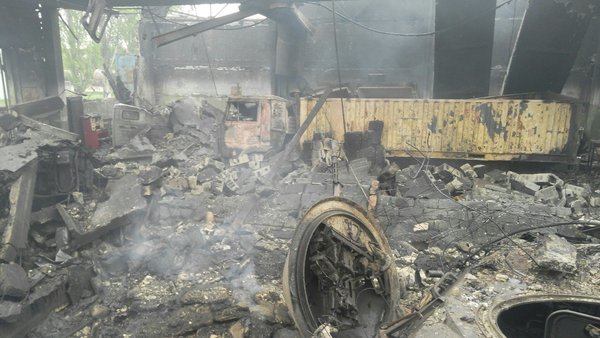 Destroyed vehicles after shelling of Maryinka in April