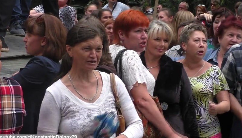 Shakhtarsk. Banners read no to armed mission. Protest drill