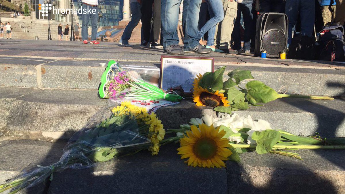 People honor the memory of murdered journalist Pavel Sheremet on Maidan Nezalezhnosti
