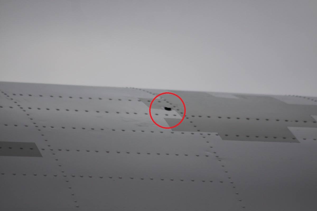 Photo : Russian Navy ship fired shots at Ukrainian An-26 military transport  