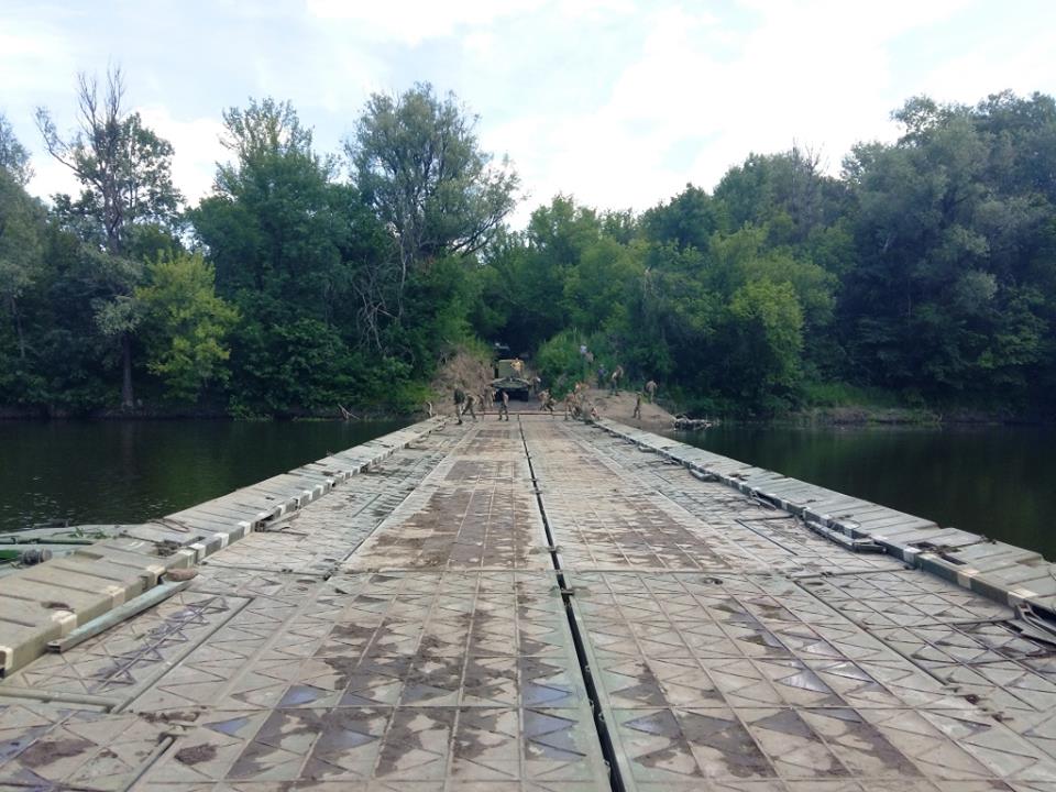 Military engineers installed a 70-meter long pontoon bridge across Siverskyi Donets near frontline Krymske at request of local residents  