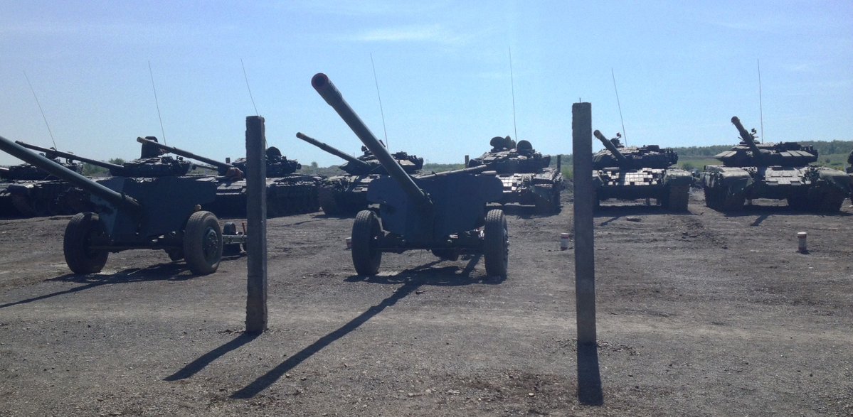 Russian forces vehicles at firing range in Zuhres