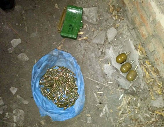 Ukrainian civilian finds a MON-50 anti-personnel landmine, 3 grenades, and 2 RPG rounds in a forested area in Donetsk    