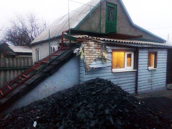 Building was damaged in Maryinka as result of shelling