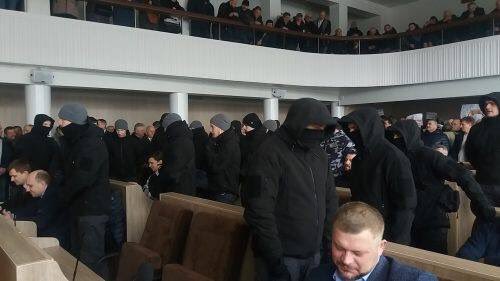 Pictures from Cherkasy city council, where National militia staged a show of force to assist the deputies, who decided to dissolve the council yesterday over crisis with heating.   