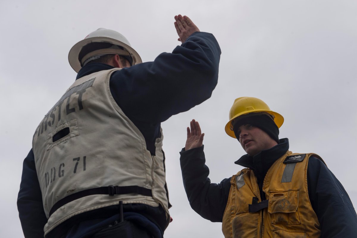 USSRoss in Black Sea: Turkish TCG Yarbay Kudret Güngör navigates alongside Ross, Lt. Gregory on watch, Boatswain's Mate 3rd Class Cheek re-enlists