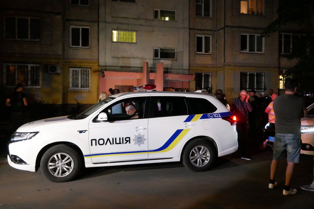 Flowers at the house where Arkady Babchenko lived and was killed early today