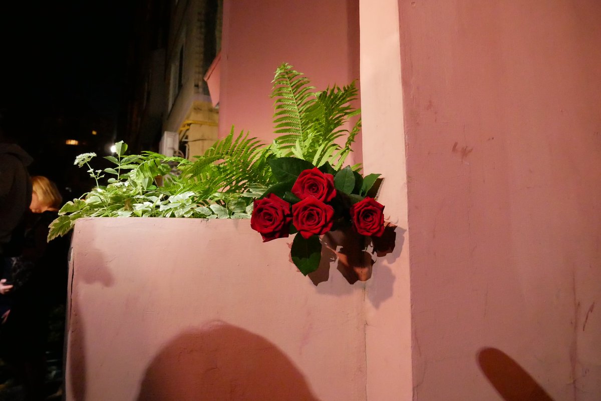 Flowers at the house where Arkady Babchenko lived and was killed early today