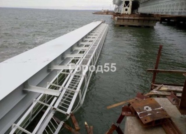 Photos: section of Kerch bridge collapsed into water