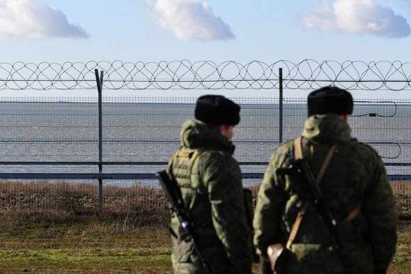 Photos from the border fence erected by Russia in occupied Crimea along the boundary to mainland Ukraine     