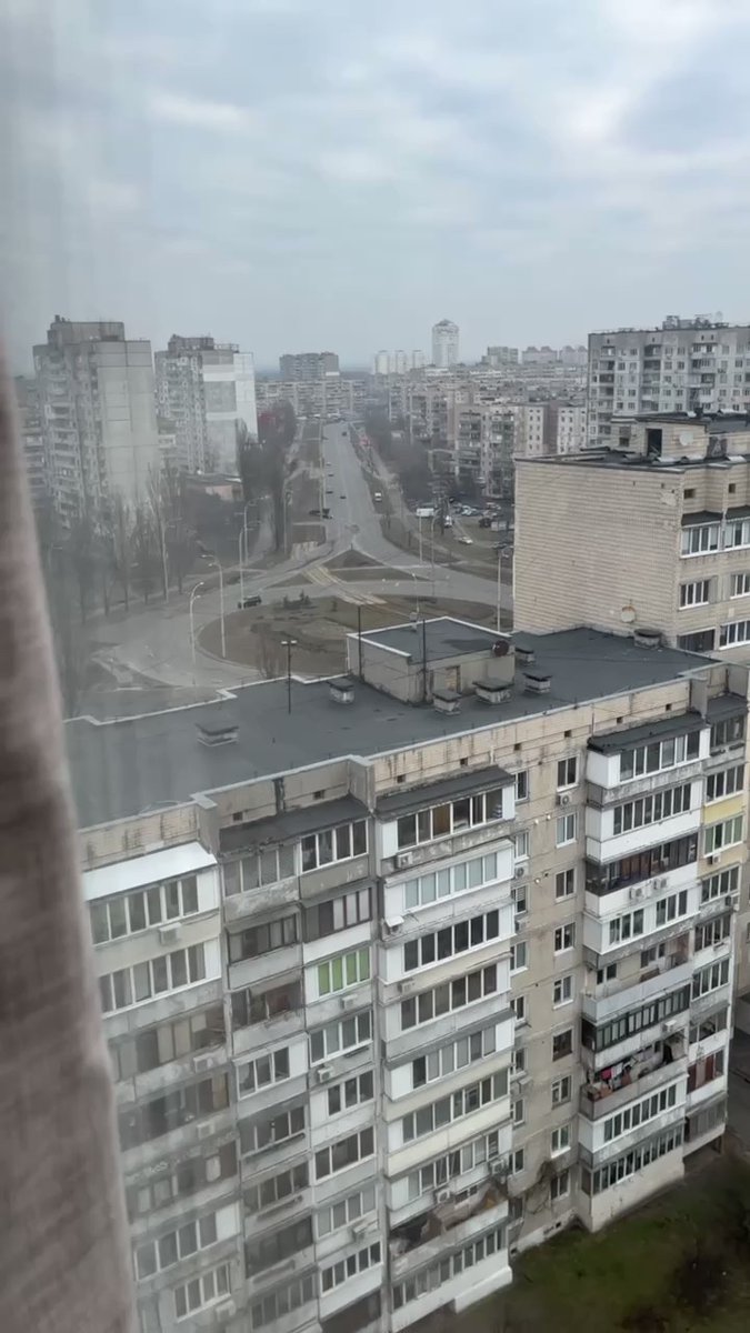 Russian military vehicle overrun civilian car in Kyiv