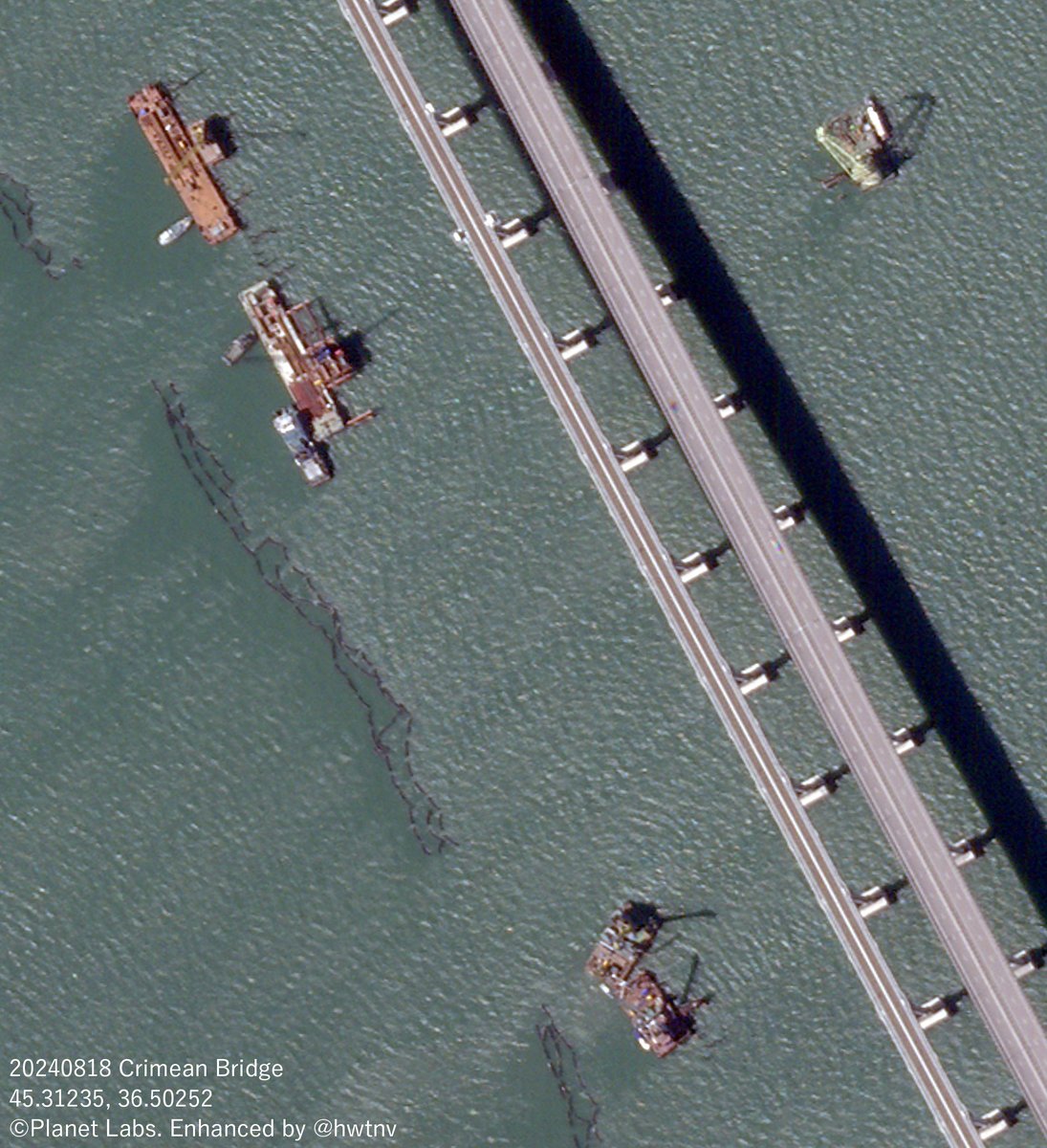 High-resolution satellite images show ships and barricades under construction near the Kerch Bridge in the Crimean Peninsula on August 18