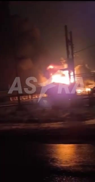 Fire in Engels, Saratov Region, continues after UAV attack. Governor said earlier that debris from downed UAVs landed at industrial facility. Locals report fire at oil depot