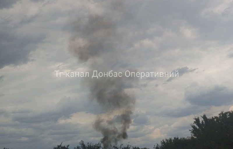 A car is on fire after shelling at the checkpoint in Kramatorsk