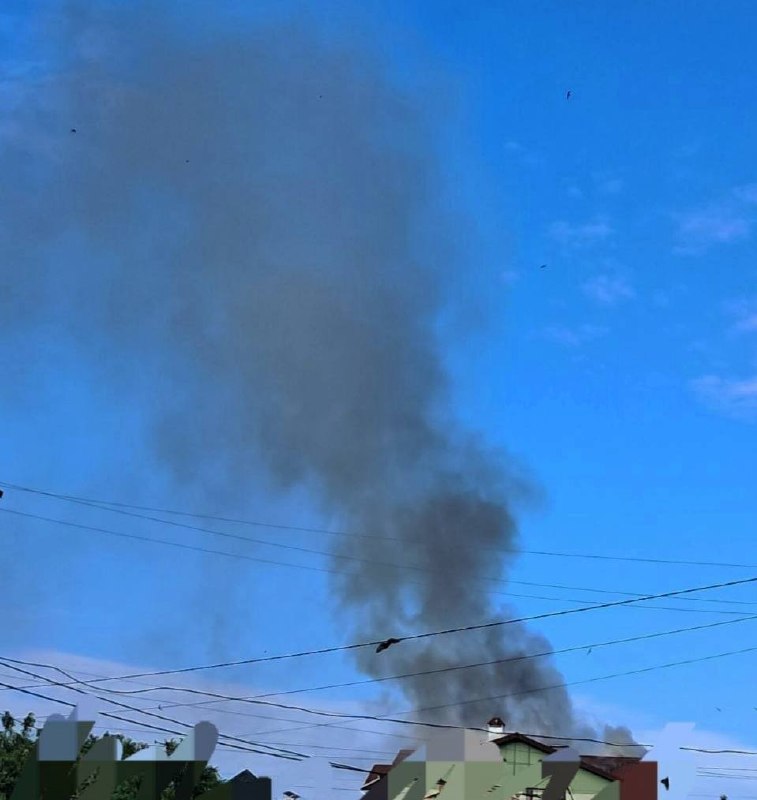 Fire caused by drone strike at the central part of Kherson